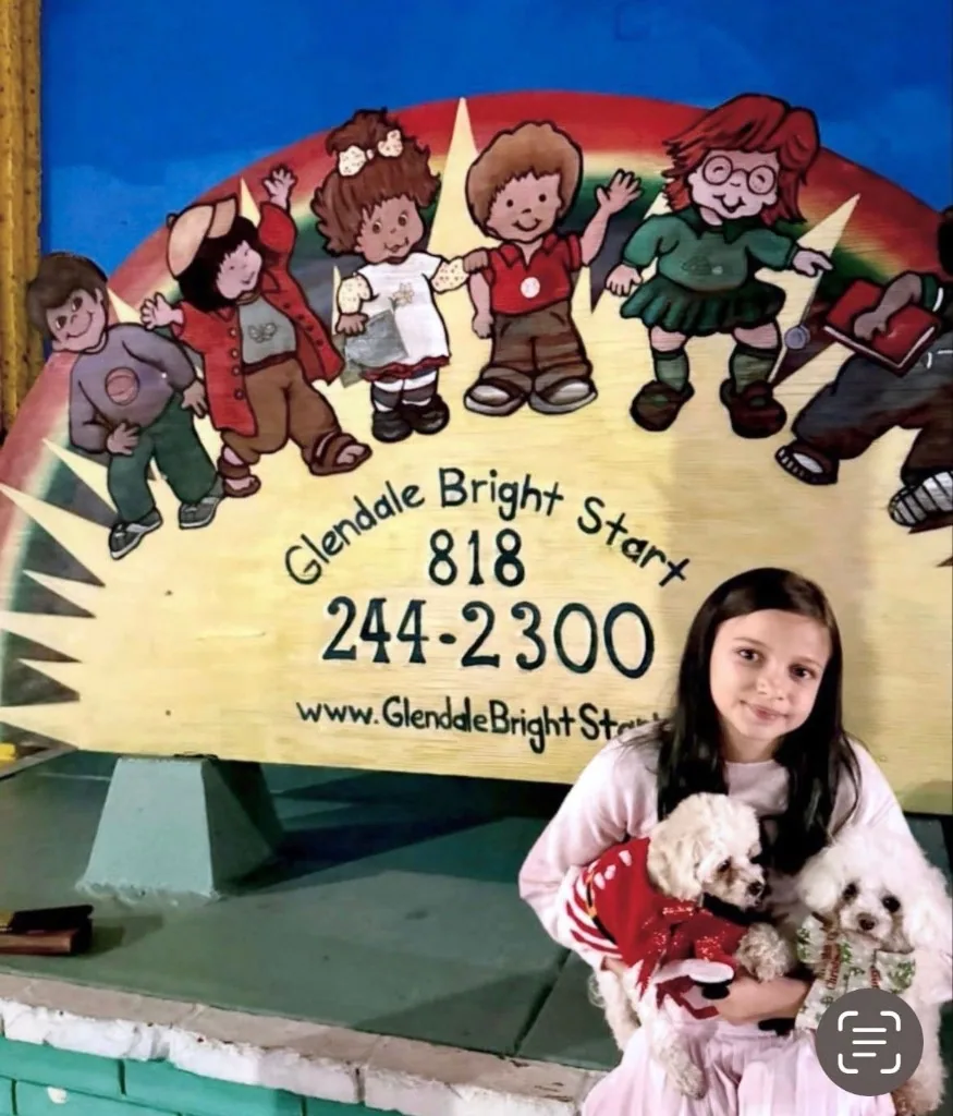 Girl with a poodle at Glendale Bright Start
